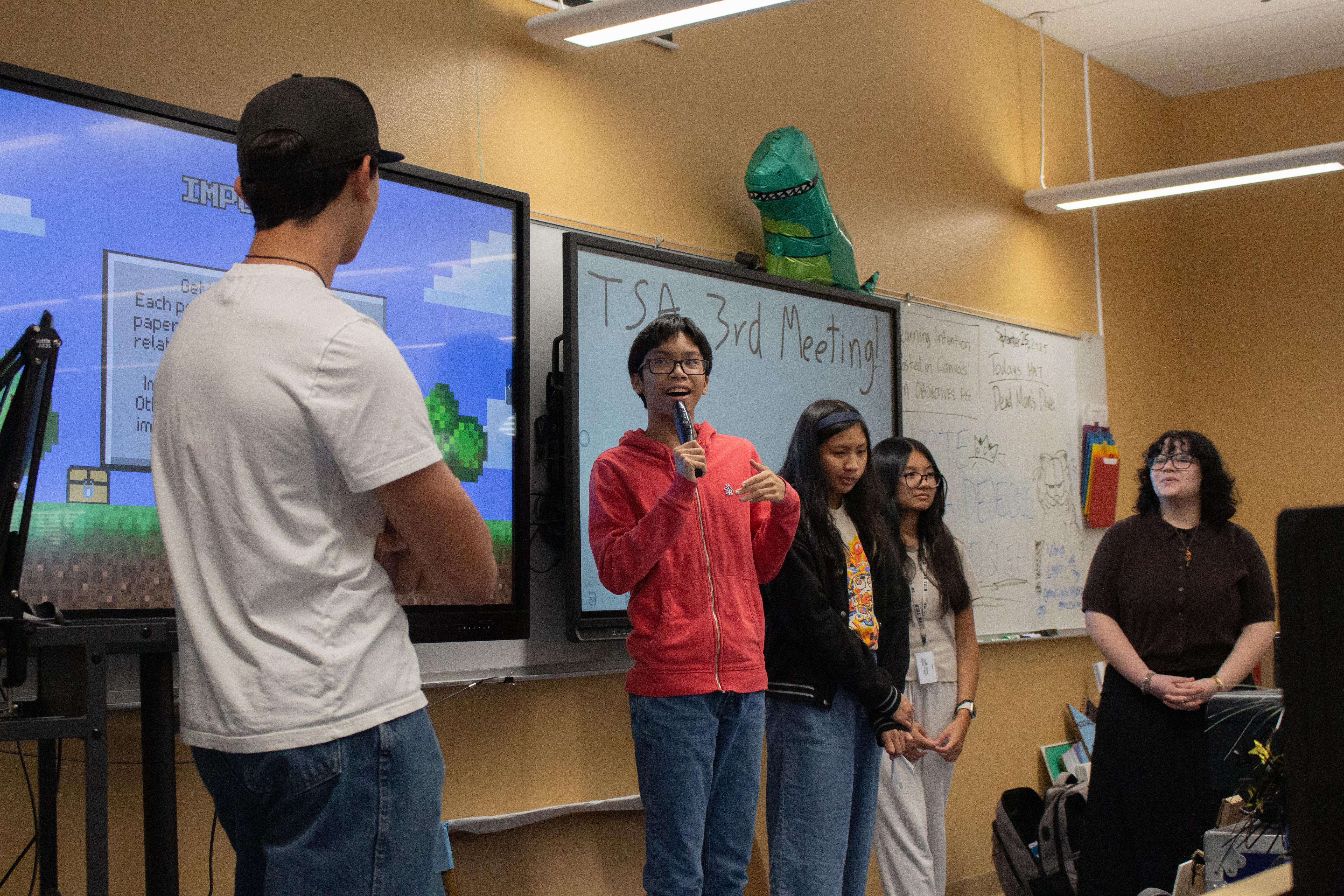 Students presenting at a TSA chapter meeting